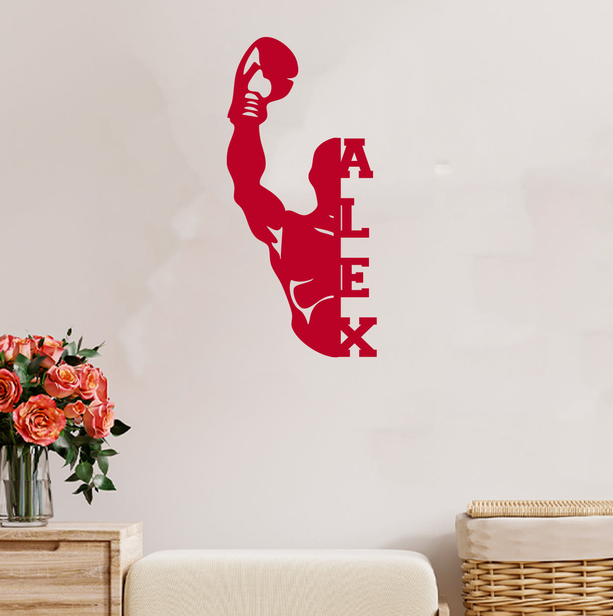 a wall decal of a man holding a basketball